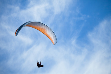 Man practicing paragliding extreme sport