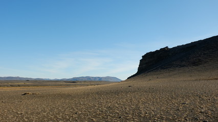 Volcanic desert with part of the crater