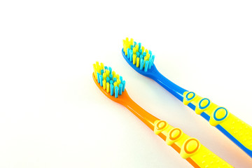 Baby toothbrushes on white background
