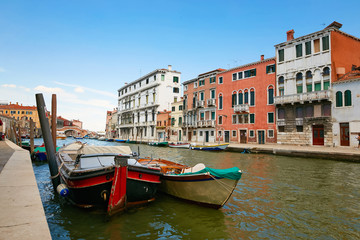 Fototapeta na wymiar Venice, Italy - August 14, 2017: Water channels of Venice.
