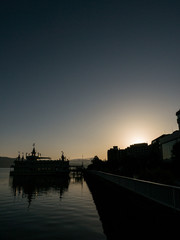 Fototapeta na wymiar Sunrise at The Lake Toya with The Boat
