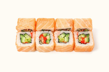 Set of salmon rolls isolated on white, closeup