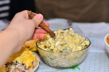 Beautifully decorated catering banquet table with different food snacks and appetizers assortment on corporate christmas party event celebration