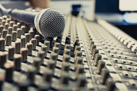 microphone on sound mixer, music background