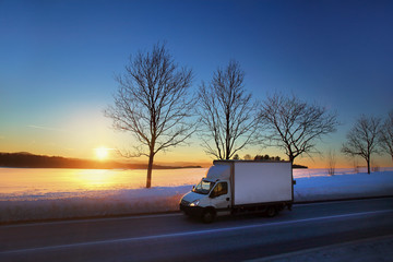 Truck transportation at sunset