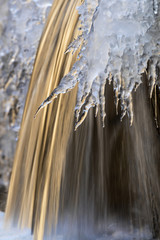 Frozen waterfall at morning sunlight, Ledges State Park, Iowa, USA.