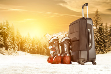 winter time and suitcase on snow space 