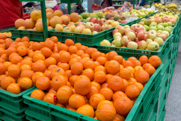 the display of fruit tangerines and apples