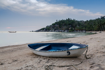 Naklejka na ściany i meble Beautiful beach with motor boat at toa island, Thailand