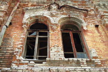 Fototapeta na wymiar a shattered window of an ancient building