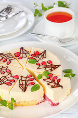cheesecake of sponge cake and cream cheese layer