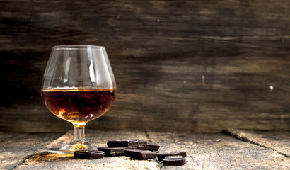 Cognac with bitter chocolate.
