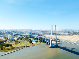 Aerial View Of Vasco da Gama Bridge And High Car Traffic In Lisbon City Of Portugal