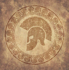 Fototapeta na wymiar Spartan helmet an icon on old paper in style grunge, is issued in antique Greek style.
