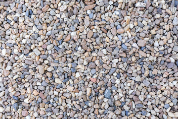 Stone pebbles texture or stone pebbles background for interior design business. exterior decoration and industrial construction idea concept design. Stone pebbles motifs that occurs natural.