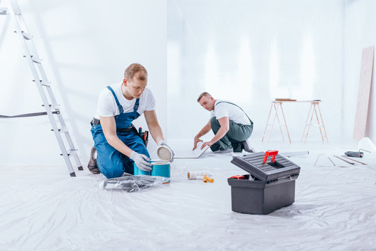 Men preparing interior to renovation