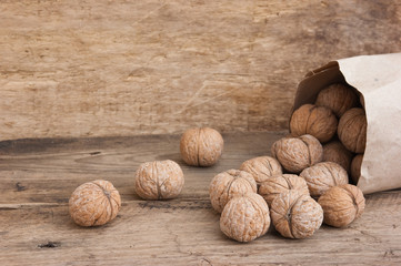 walnuts in a kraft paper bag