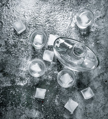 Vodka with ice in glasses.