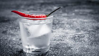 Vodka shots with hot pepper.