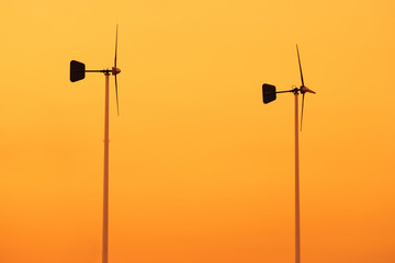 Wind turbine in sunset background.Thailand.