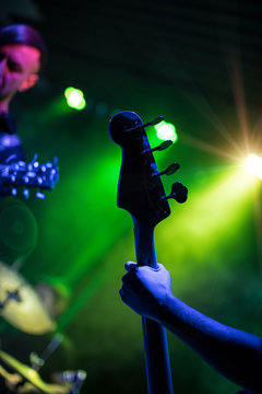 Guitarist playing on electric guitar.