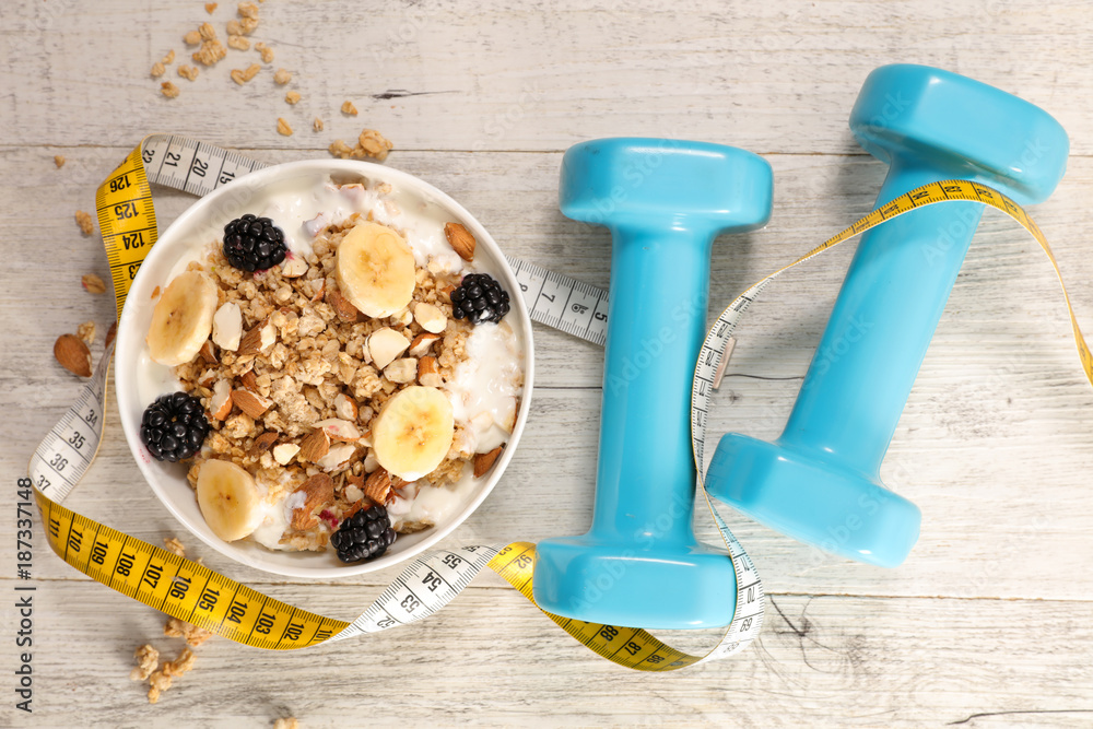 Canvas Prints bowl of cereal, fruit and dumbbell