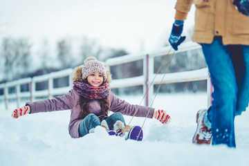 Dad with daughter outdoor in winter