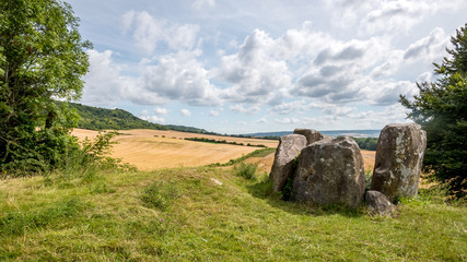 Fototapeta na wymiar Coldrum Long Barrow, Kent, England. The standing stones are the remains of an early Neolithic barrow near Trottiscliffe in the English county of Kent.
