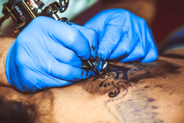 master tattoo woman on her back