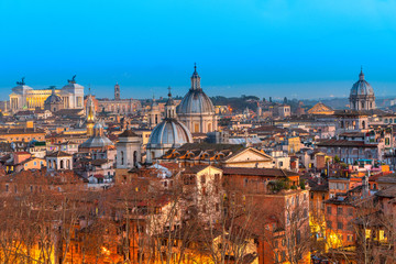 Fototapeta na wymiar Rome, skyline view at su set from Castel sant'angelo. Italy.