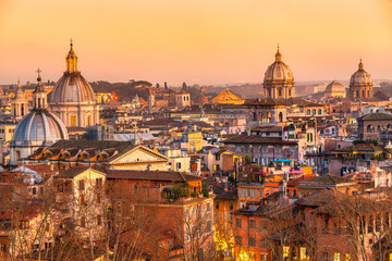 Fototapeta na wymiar Rome, skyline view at su set from Castel sant'angelo. Italy.