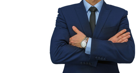man in suit crossing his arms on chest
