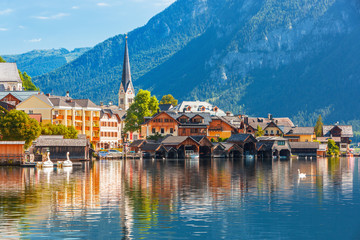 Scenic picture-postcard view of famous Hallstatt mountain village in the Austrian Alps at beautiful...