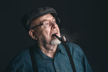 man smoking a pipe