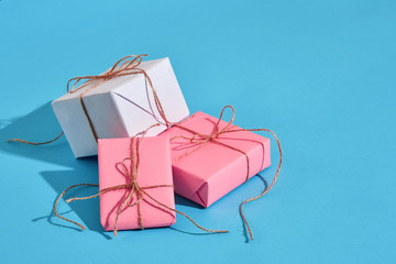 Craft paper wrapped present boxes craft rope bow ribbon with sha