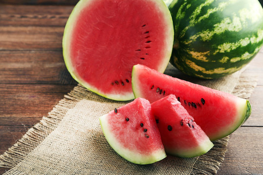 Slices of watermelons on wooden table