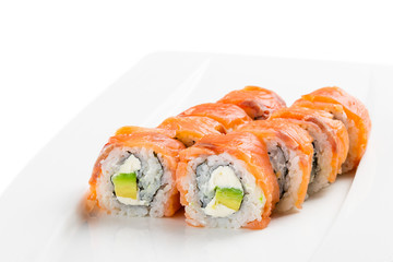 Philadelphia roll urumaki sushi made of fresh salmon, cream cheese, and avocado