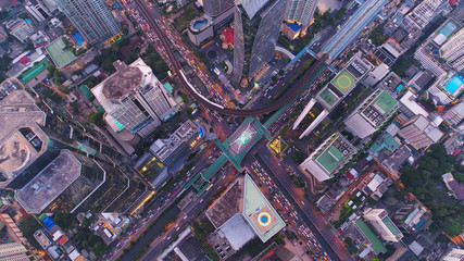 Top view city , Aerial view road , Expressway with car lots in the city in Thailand. Beautiful Street at downtown.Road roundabout