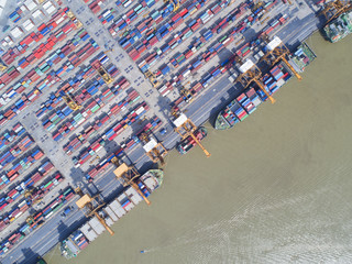 container,container ship in import export and business logistic,By crane,Trade Port , Shipping,cargo to harbor.Aerial view,Water transport,International,Shell Marine,transportation,logistic,trade,port