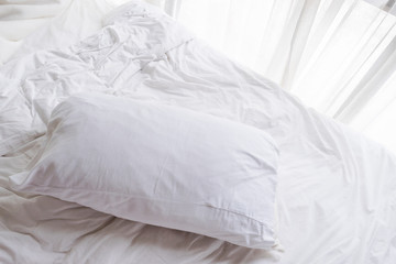 Fototapeta na wymiar Pillow on bed