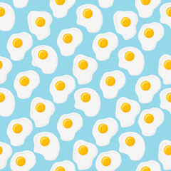 Seamless pattern with fried eggs on blue background. Vector texture.