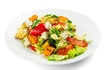 Warm salad with grilled vegetables, bulgur and feta