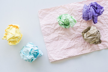 Crumpled paper balls on background