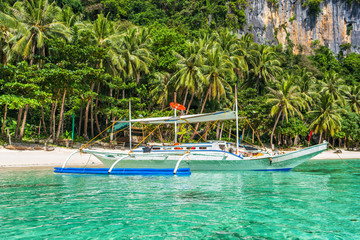 Small bangka boat on the bay of El Nido, Philippines