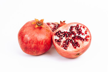 Fresh Red Ripe Pomegranates Isolated On White Background