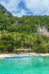 Small bangka boat on the bay of El Nido, Philippines