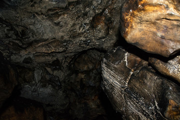 View inside a deep cave. The dark abyss.