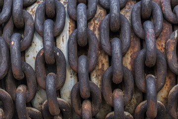Urbex. Rusty chain of abandoned machinery