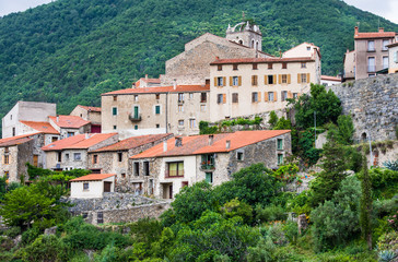 Fototapeta na wymiar Mosset small and picturesque french village,member of Les Plus Beaux Villages de France (The most beautiful villages of France).Mosset,Pyrenees-Orientales