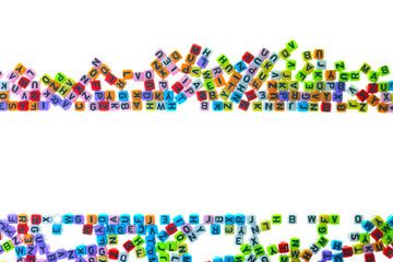 English letters are in many colors scattered in rows and empty.